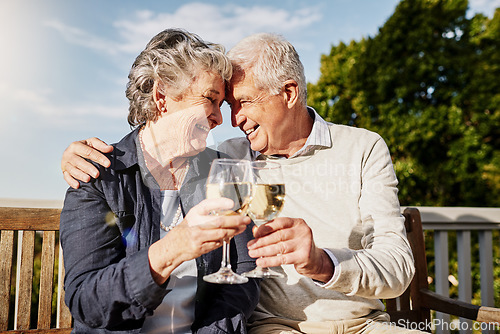 Image of Love, cheers and happiness, old couple with wine glass to celebrate anniversary on patio of vacation home. Romance, senior man and woman in embrace with champagne toast, smile and romantic holiday.