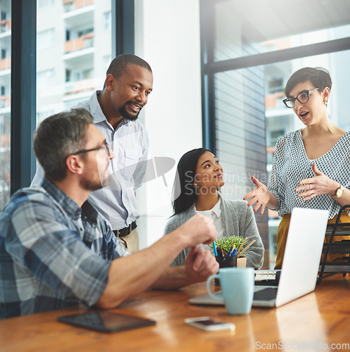 Image of Teamwork, laptop and idea with business people in meeting for project management, review or planning. Technology, website and training with group of employees in office for collaboration and coaching