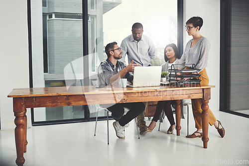 Image of Strategy, laptop and coaching with business people in meeting for project management, review or planning. Technology, website and training with group of employees in office for collaboration and idea