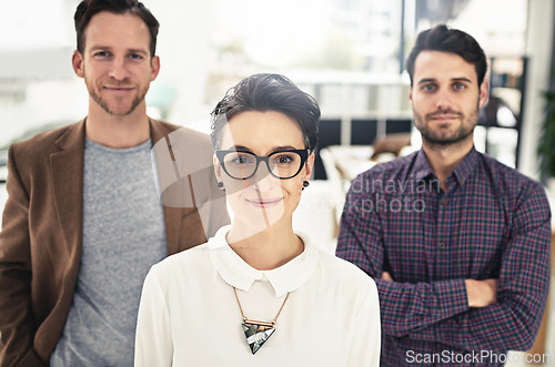 Image of Portrait, collaboration and leadership with a business woman and her team standing in the office together. Management, leader or teamwork with a group of businesspeople looking confident about vision