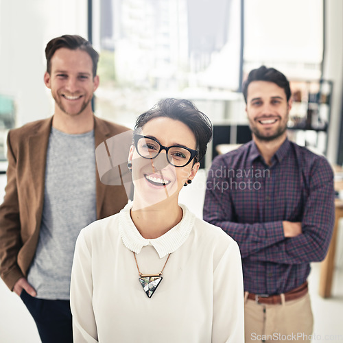 Image of Portrait, collaboration and management with a business woman and her team standing in the office together. Leadership, manager and teamwork with a group of businesspeople looking confident about work