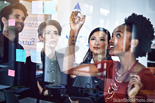 Image of Planning, brainstorming and business people with ideas on a board for schedule in a meeting. Teamwork, office and diversity of group of employees writing a strategy, notes or a plan for collaboration