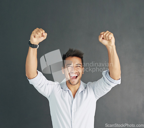 Image of Portrait, celebration and business man on wall background, excited and isolated with mockup. Winner, achievement and male professional celebrate winning, happiness and goals, success and good news.