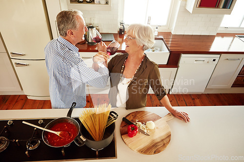 Image of Romance, wine or happy old couple cooking food for a healthy vegan diet together with love in retirement. Romantic senior woman drinking or bonding in house kitchen with mature husband at dinner