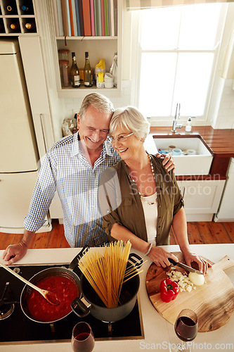 Image of Affection, smile or happy old couple kitchen cooking with love or healthy food for dinner together at home. Embrace or above of senior woman helping or hugging an elderly husband in meal preparation