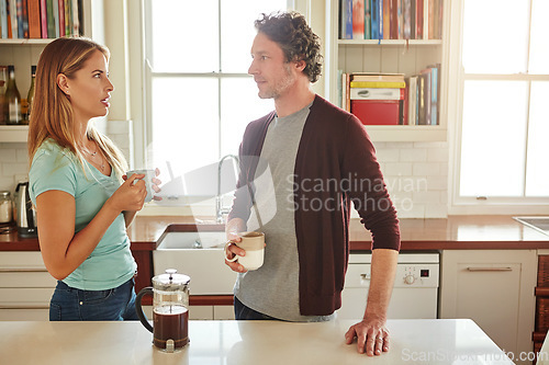 Image of Relax, coffee or couple talking in a kitchen at home bonding or enjoying quality morning time together. Love, wellness or mature man in conversation, relaxing and drinking espresso tea with woman