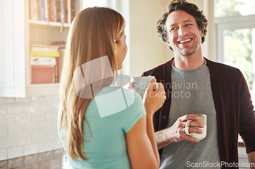 Image of Relax, tea or happy couple talking in a kitchen at home bonding or enjoying quality morning time together. Love, smile or mature man laughing, relaxing and drinking espresso coffee with woman at home