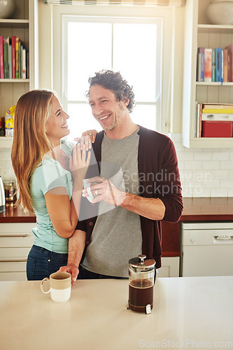 Image of Affection, coffee or happy couple laughing in kitchen at home bonding or enjoying quality time together. Embrace, hugging or above of funny mature man relaxing or drinking tea with woman at home