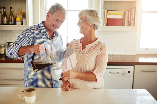 Image of Happy, coffee or old couple talking in a kitchen at home bonding or enjoying quality morning time together. Love, wellness or mature man in conversation, relaxing or drinking espresso tea with woman