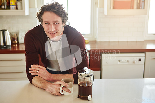 Image of Portrait, kitchen or happy man drinking coffee for breakfast for energy to start the day at home. Smile, relax or person enjoying fresh hot tea or strong espresso with caffeine in morning routine