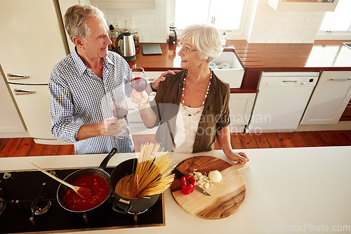 Image of Top view, wine or happy old couple cooking food for a healthy vegan diet together with love in retirement at home. Senior woman drinking or bonding in house kitchen with mature husband at dinner