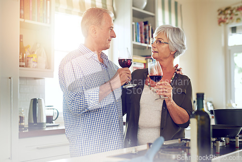 Image of Wine, toast or old couple hug in kitchen in celebration of marriage anniversary together in retirement at home. Cheers or senior woman drinking or bonding in a house with mature husband at dinner