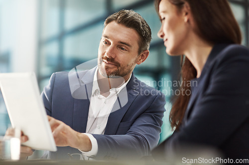 Image of Teamwork, tablet and planning with business people in the office for research on a company project. Collaboration, technology and brainstorming with a corporate team talking about strategy at work