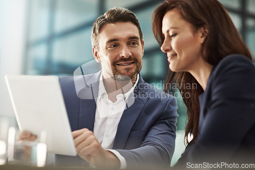 Image of Collaboration, tablet and strategy with a business team in the office for research on a company project. Teamwork, technology and brainstorming with corporate people talking while planning at work