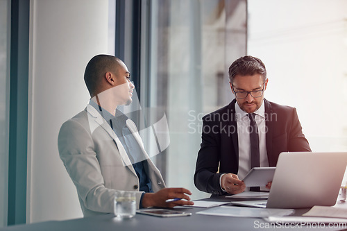 Image of Tablet, laptop and business man with partner in corporate meeting, teamwork and planning or data analysis of profit. Professional people on digital technology of financial report or b2b collaboration