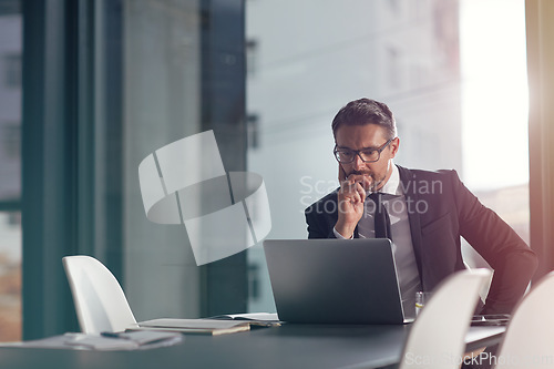 Image of Business man, laptop and thinking, reading or online decision, choice or solution of software data or boss review. Planning, focus and problem solving of corporate person or CEO on computer in office