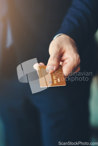 Image of Debit card, hand and closeup of a businessman for shopping, financial bills and loans. Finance, customer and zoom of professional male person paying, buying and spending money at a retail store.