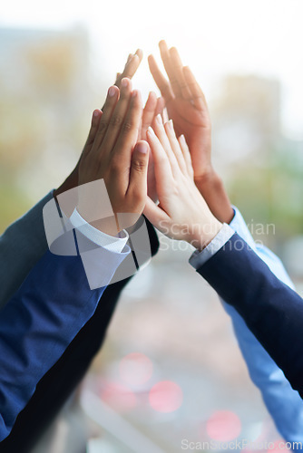 Image of Solidarity, hands and high five for teamwork, success and team building. Group, collaboration and business people with hand together for cooperation, support and synergy, motivation and celebration