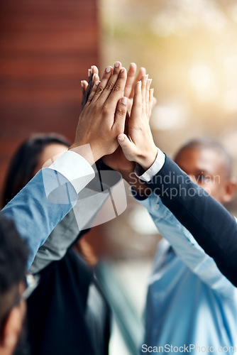 Image of Business people, hands and high five for teamwork, collaboration and team building. Group, solidarity and employees with hand together for cooperation, support and synergy, motivation and celebration