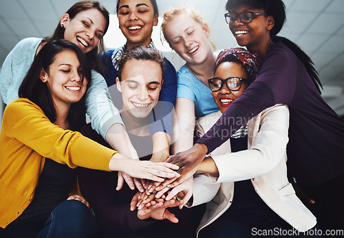 Image of Teamwork, support and people hands stacked for collaboration, target or team building, solidarity and diversity group. Circle, happy and business women and men with together sign and startup mission