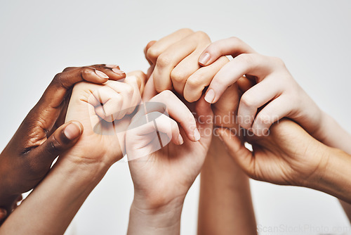 Image of People, group diversity and holding hands isolated on a white background for solidarity, support and collaboration. Love, power and community of women and men hand or palm together for hope or care