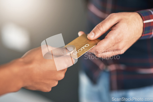 Image of Closeup, hands and man with a credit card, payment and transaction with discount, sales and retail. Zoom, buyer and shopper with banking, shopping and customer with plastic, paying and services