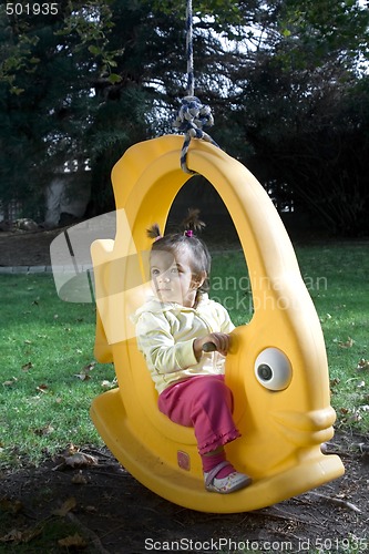 Image of Little Girl on the Swing