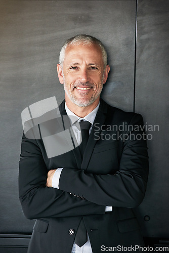 Image of Business man, happy and portrait with a smile and arms crossed in studio. A confident senior entrepreneur or executive person on a grey wall with corporate clothes, positive mindset and career pride