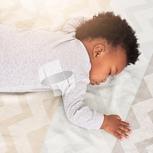 Image of Baby, african boy and sleeping in bedroom for rest, health and peace for growth, development and relax in family home. Black male infant, tired and sleep on bed with fatigue, quiet and calm in house