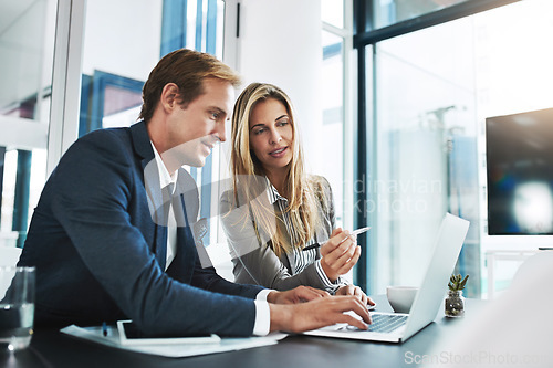 Image of Man, woman and laptop with corporate partner, planning or typing for project, proposal and company vision. Businessman, partnership and computer with discussion, teamwork and consulting with analysis