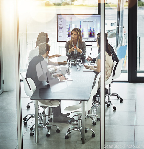 Image of Business, presentation and people in office for meeting, planning, and problem solving discussion. Finance, collaboration and woman leader with team in a boardroom for sharing vision, growth and idea