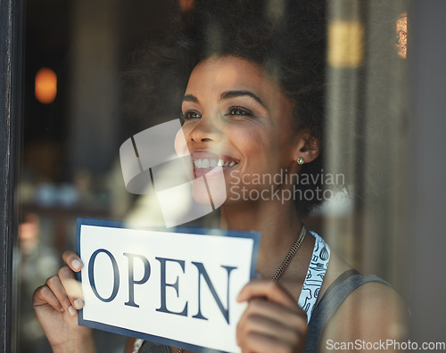 Image of Open sign, restaurant store window and happy woman, small business owner or manager with cafe poster for welcome. Commerce billboard, startup coffee shop and female waitress for retail sales service