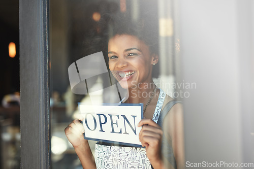 Image of Cafe open sign, window portrait and happy woman with smile for retail service, restaurant welcome or coffee shop opening. Small business owner, board and person smiling for entrepreneur startup store