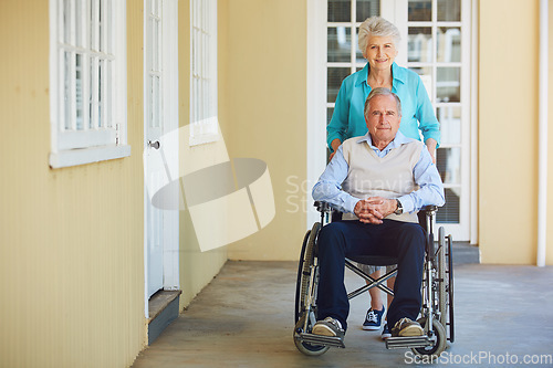 Image of Portrait, old woman or senior man wheelchair in retirement home helping push husband for support. Happy people, mature couple or elderly lady with a mature person with a disability in house