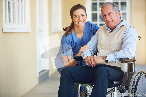 Image of Portrait, caregiver or old man in a wheelchair in hospital helping an elderly patient for support in clinic. Happy, medical or healthcare social worker talking to a senior person with a disability