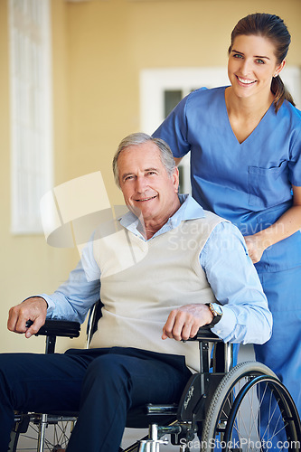 Image of Portrait smile, caregiver or old man in wheelchair in hospital clinic helping an elderly patient for trust or support. Medic, happy or healthcare caregiver pushing an senior person with a disability