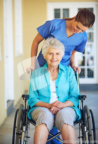 Image of Portrait, caregiver or happy old woman in wheelchair in hospital clinic helping an elderly patient for support. Trust, smile or healthcare medical nurse talking to a senior person with a disability