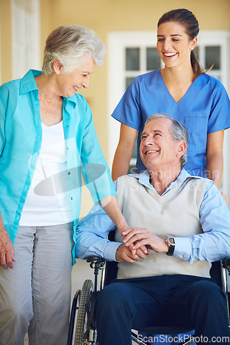 Image of Wife, nurse laughing or old man in wheelchair in hospital clinic helping an elderly patient for support. Funny, happy or healthcare nurse with senior person with a disability and woman holding hands