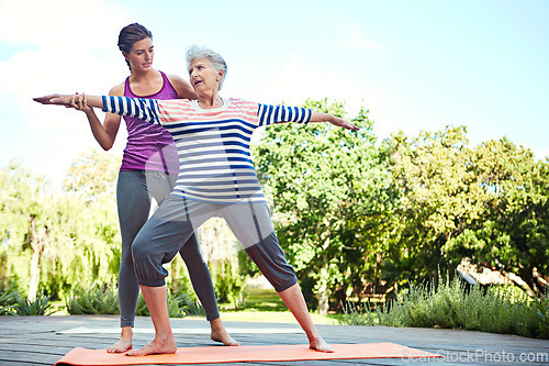 Image of Nature, senior woman and yoga coach teaching exercise, coaching retirement workout or outdoor fitness. Personal trainer, wellness instructor and old person, yogi or people learning pilates training