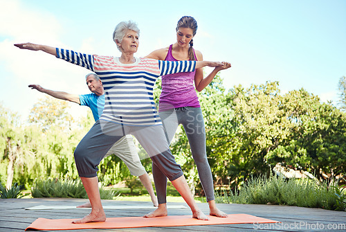Image of Nature, elderly people and yoga coach, woman or personal trainer teaching exercise, outdoor workout or fitness. Instructor, wellness couple and old person learning pilates, training or health balance