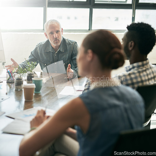 Image of Corporate training, staff and employees in a meeting, planning and communication for profit growth. Business people, group and leader in an office, brainstorming and share ideas for startup success