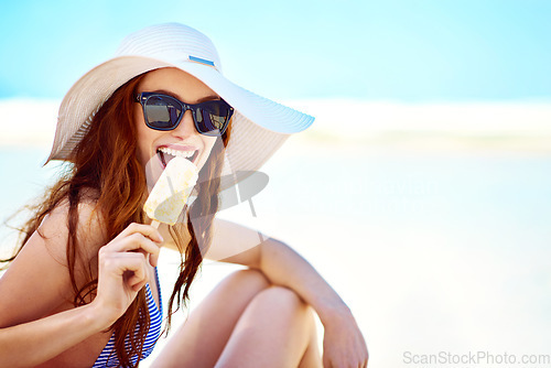 Image of Popsicle, sunglasses and portrait of woman at beach on vacation, holiday travel and mockup in summer hat. Happiness, ice cream and female tourist eating by ocean shore and enjoying snack in Australia