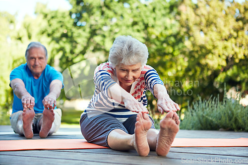 Image of Nature, yoga stretching and senior couple start outdoor exercise, training workout or health fitness on park floor. Wellness, freedom and elderly marriage people, man or woman doing pilates warm up