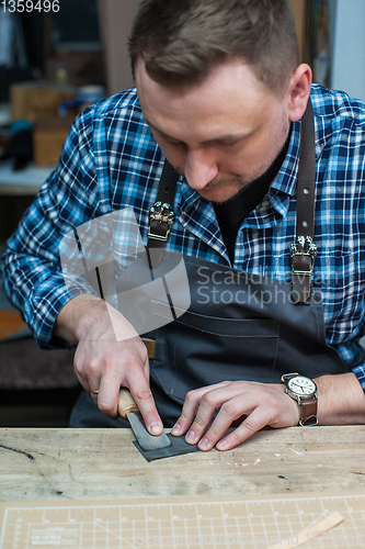 Image of Concept of handmade craft production of leather goods.