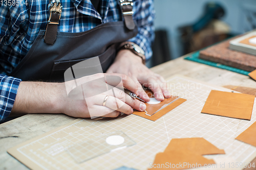 Image of Concept of handmade craft production of leather goods.