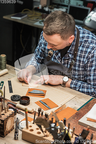 Image of Concept of handmade craft production of leather goods.