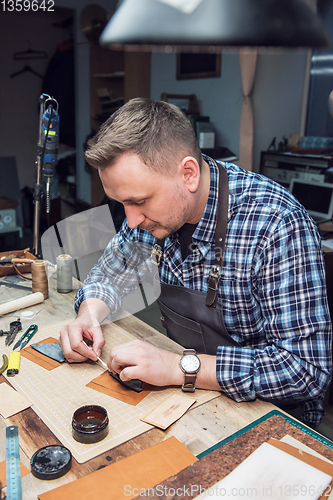 Image of Concept of handmade craft production of leather goods.