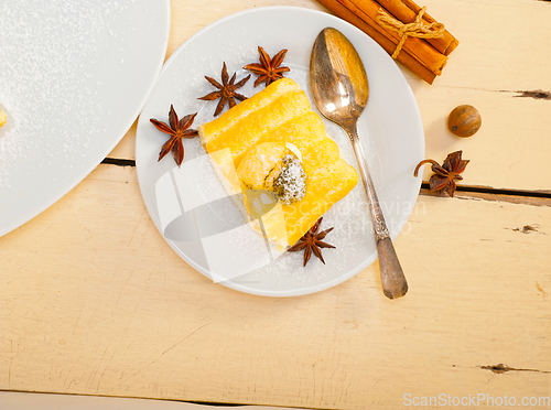 Image of cream roll cake dessert and spices