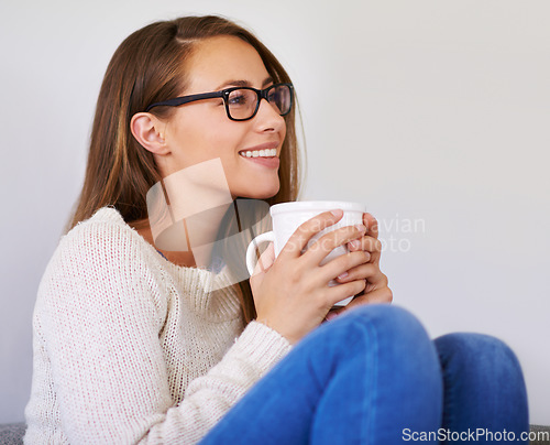 Image of Thinking, coffee and smile of woman in living room home enjoying caffeine, espresso or cappuccino. Happiness, tea and female person with idea in lounge, drinking latte beverage and relax in house.