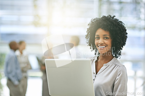 Image of Black woman in business, laptop with smile in portrait and technology with connectivity and success in workplace. Professional female person holding pc, pride with email communication and internet
